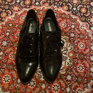 ALDO black patent brogues with black ribbon laces